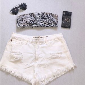 High waisted white denim shorts. Never been worn.